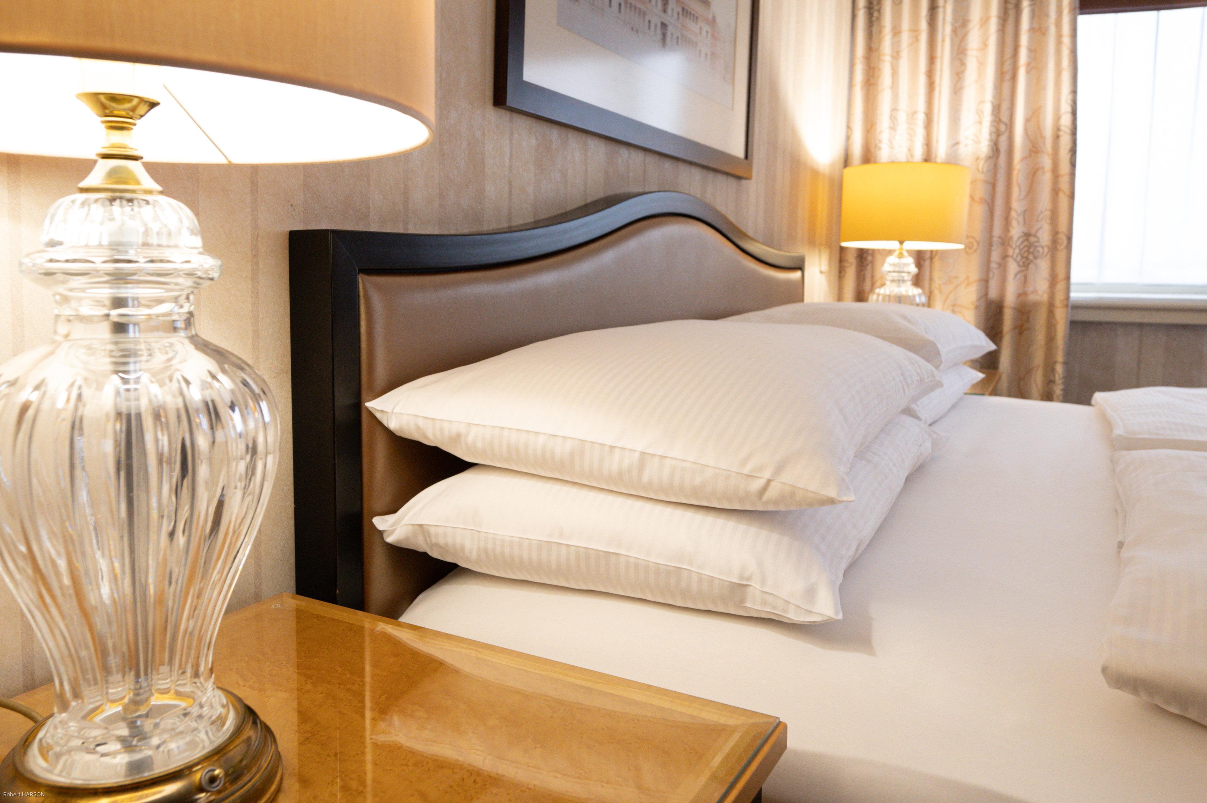 Intercontinental Wien By Ihg Exterior photo A bed with two pillows