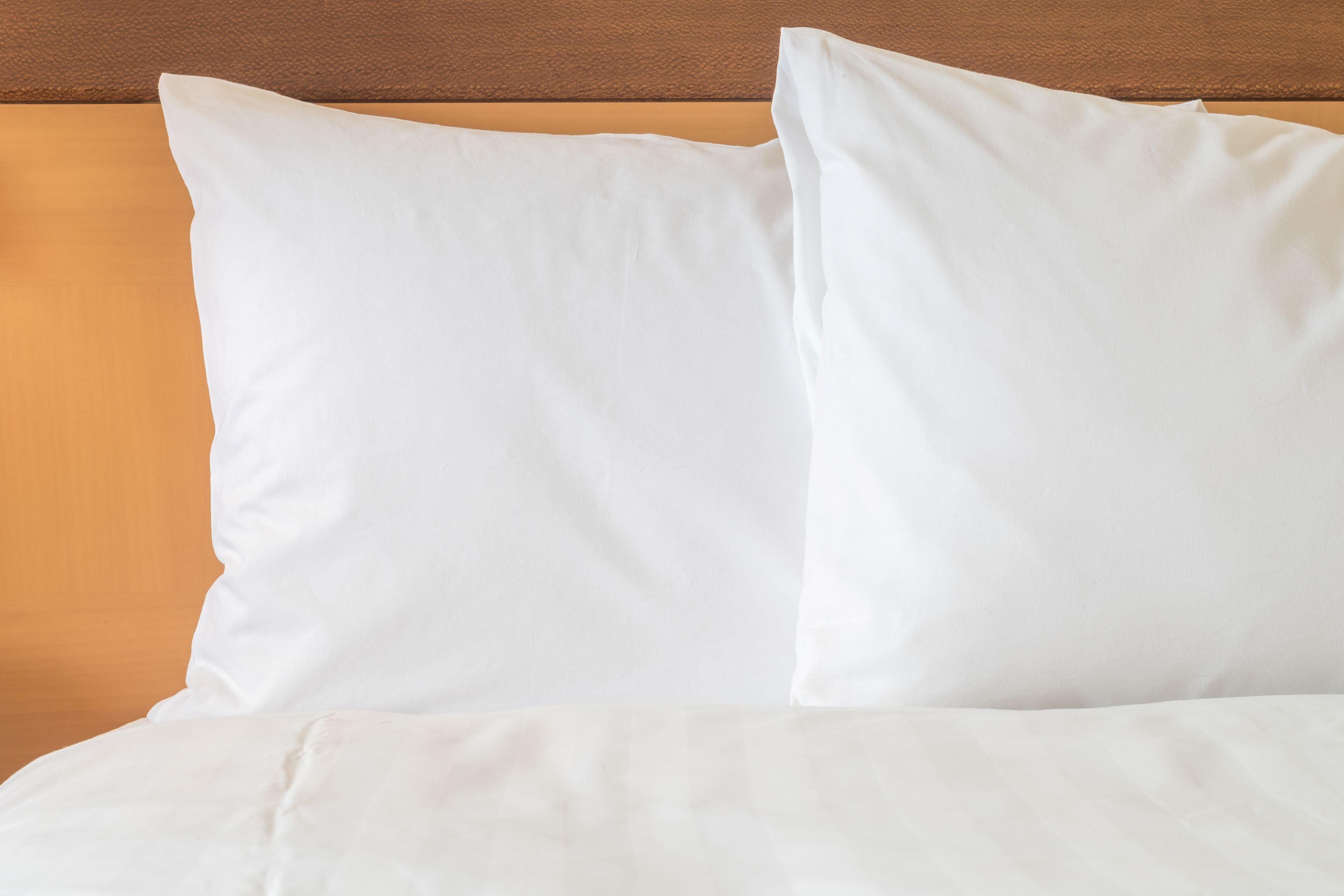 Intercontinental Wien By Ihg Exterior photo Two pillows on a bed